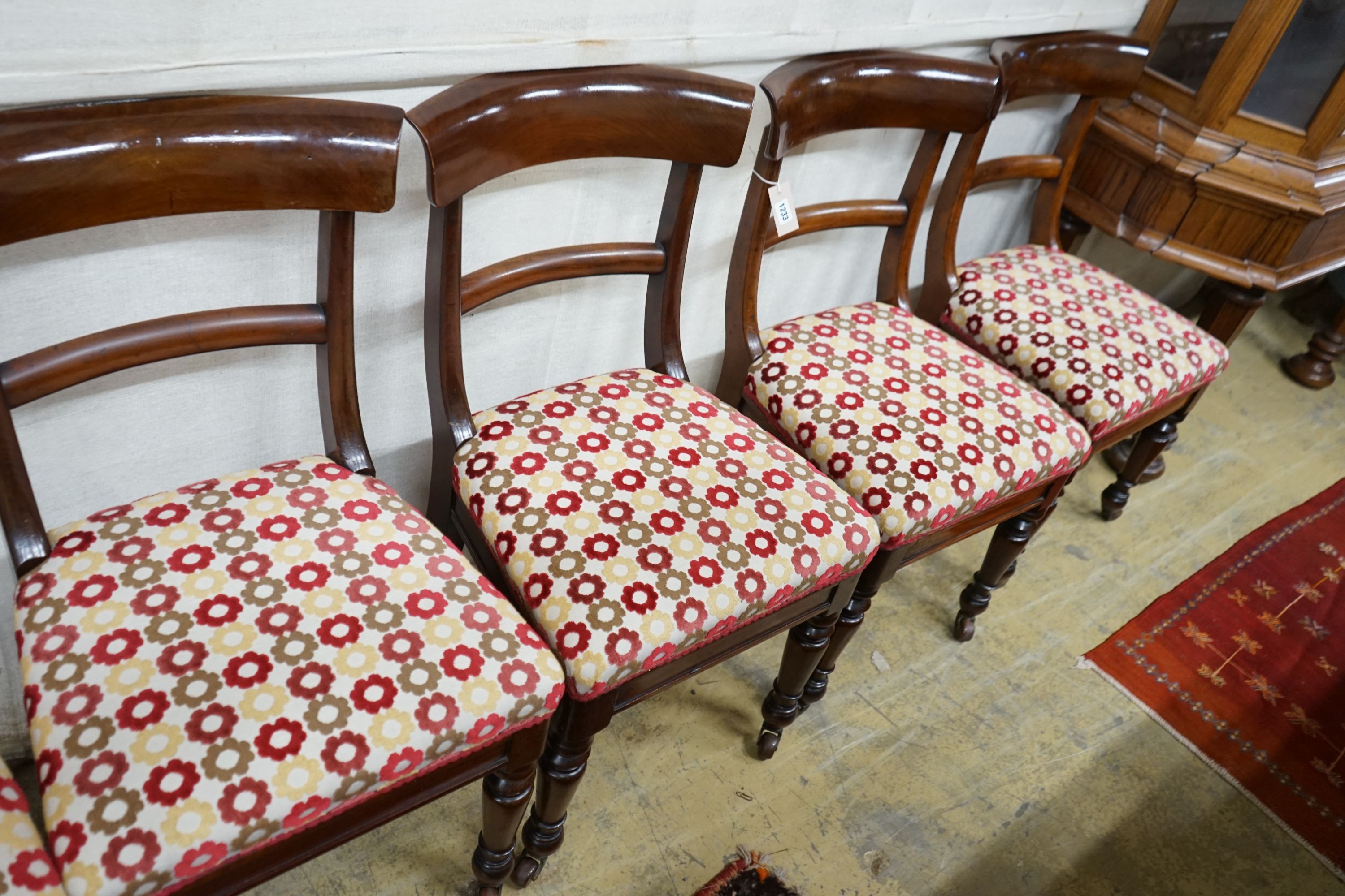 A set of eight mid Victorian mahogany dining chairs